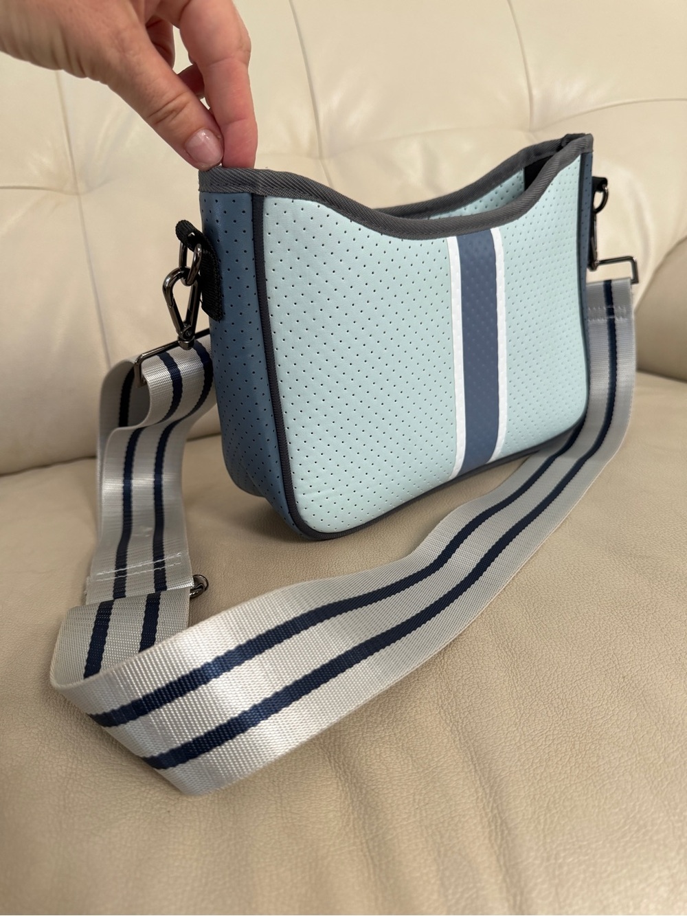 Haute Shore Blair Crossbody bag features a light blue